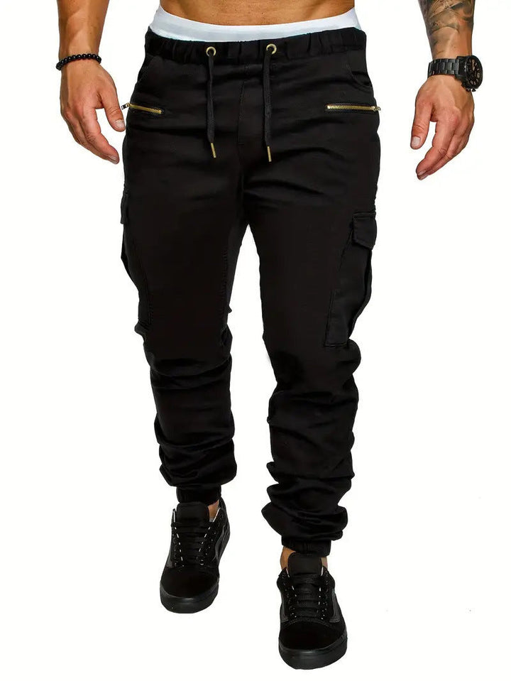 Men's slim cargo sweatpants featuring an elastic waist and secure zip pockets, perfect for loungewear.