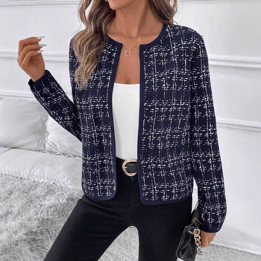 Professional women's fashion blazer, a smart structured jacket featuring subtle contrast accents.