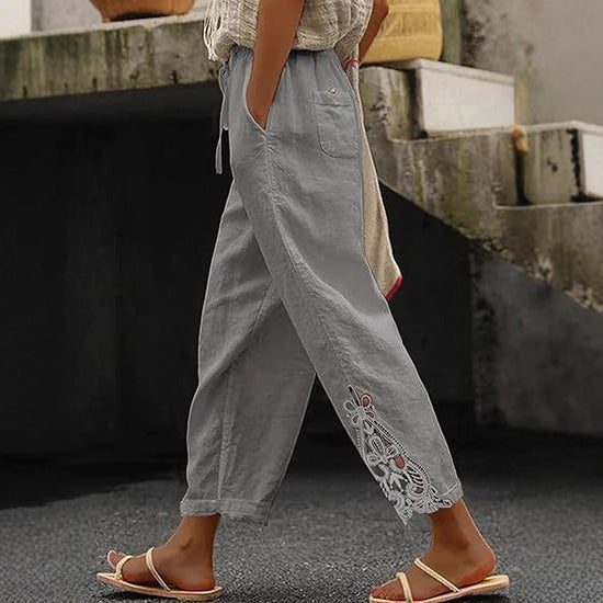 Women's lightweight embroidered trousers with unique side design, perfect for casual summer fashion.