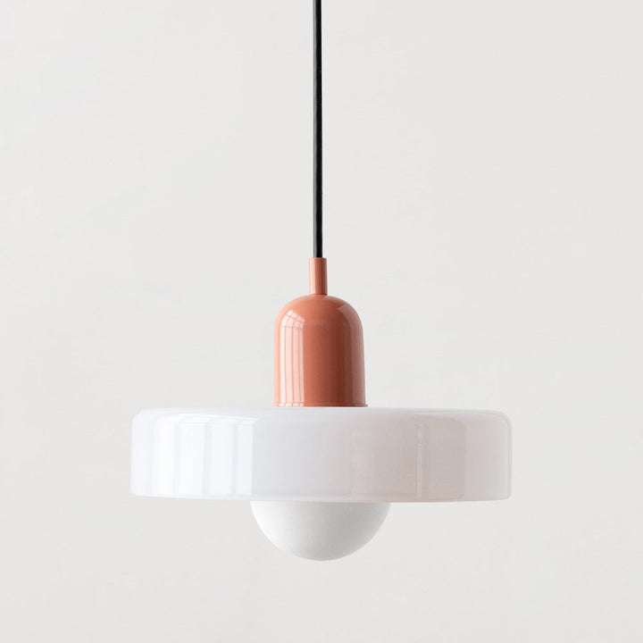 Adjustable height Bauhaus pendant, warm ambient light for dining areas.
