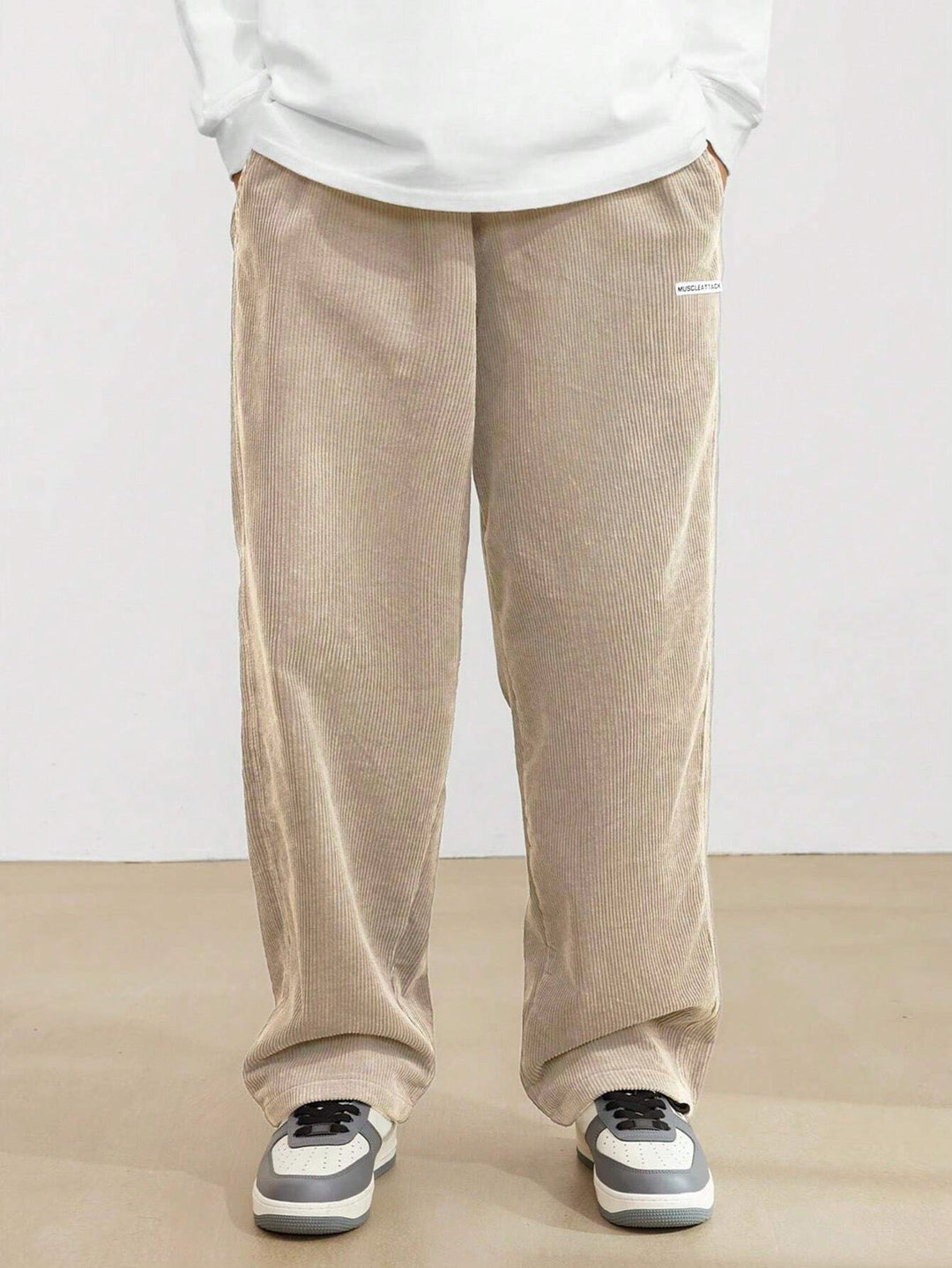 Men's casual wide leg pants with comfortable elastic waist. Loose fit & versatile for daily style.