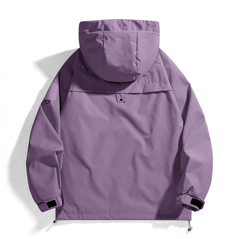 Versatile women's waterproof jacket, perfect for outdoor activities. Adjustable hood for all-weather protection.