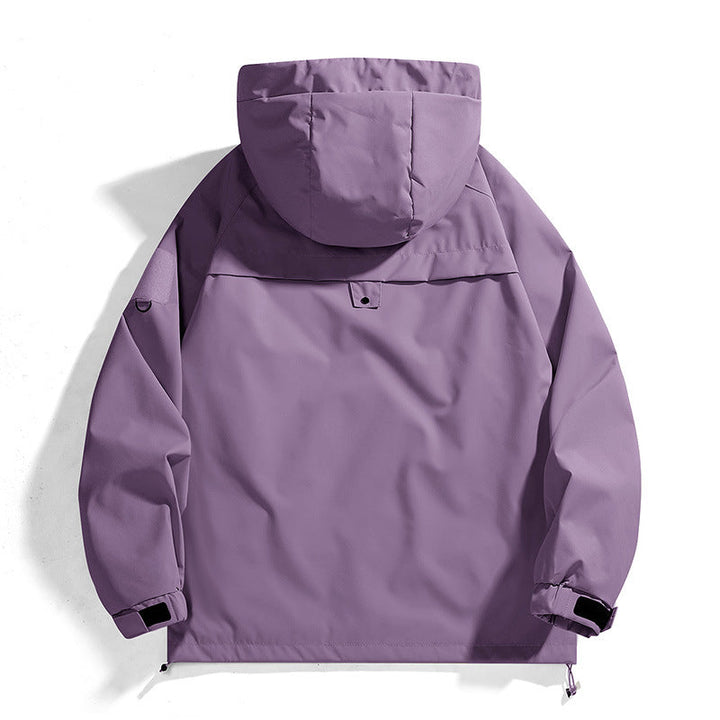 Versatile women's waterproof jacket, perfect for outdoor activities. Adjustable hood for all-weather protection.
