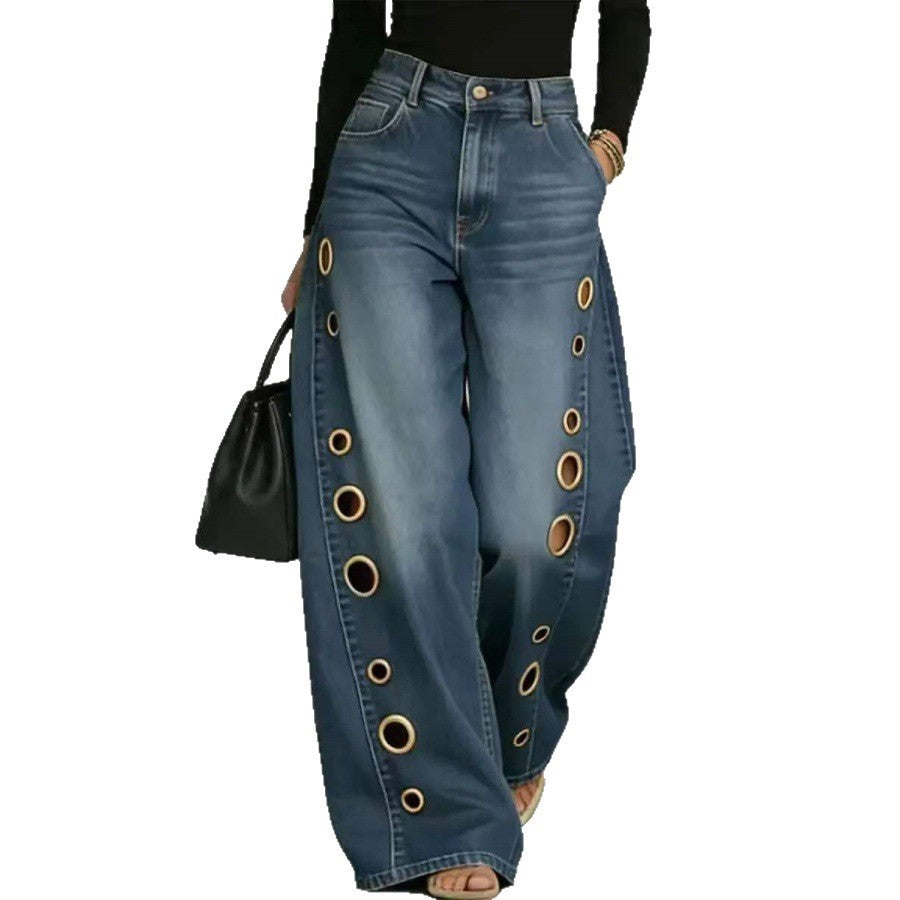 Fashionable women's wide-leg denim jeans, high-waisted with elegant decorative eyelets.