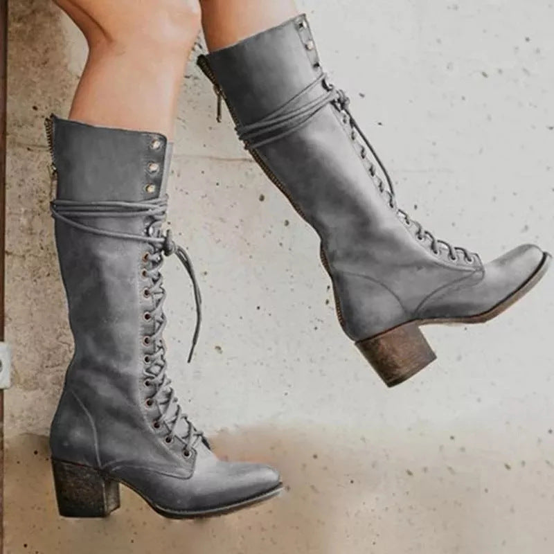 Chic women's tall lace-up boots, featuring a comfortable design and elegant knee-high fit.