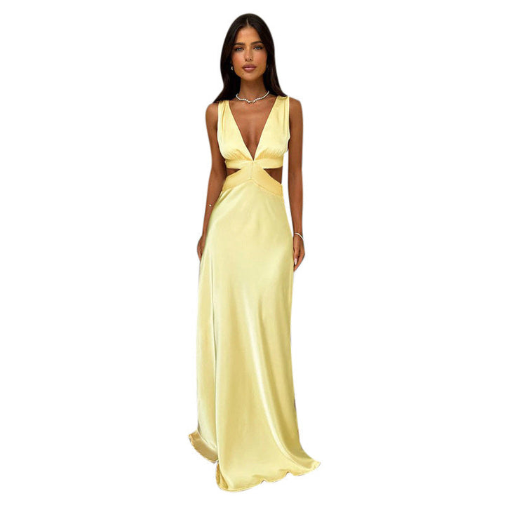 Stunning yellow V-neck evening dress for women, featuring alluring waist cutouts & a flowing floor-length skirt.