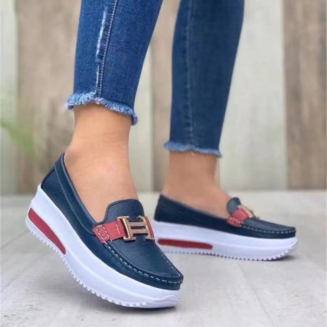 Everyday women's wedge slip-on shoes, offering comfortable footwear for a chic, casual look.