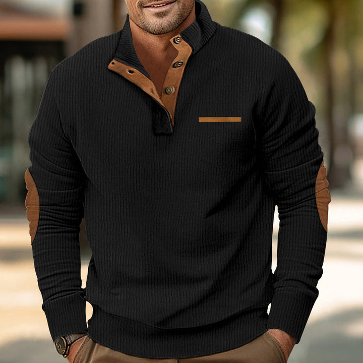 Elegant men's zip sweater, navy knit, sophisticated faux leather paneling, business casual wear.