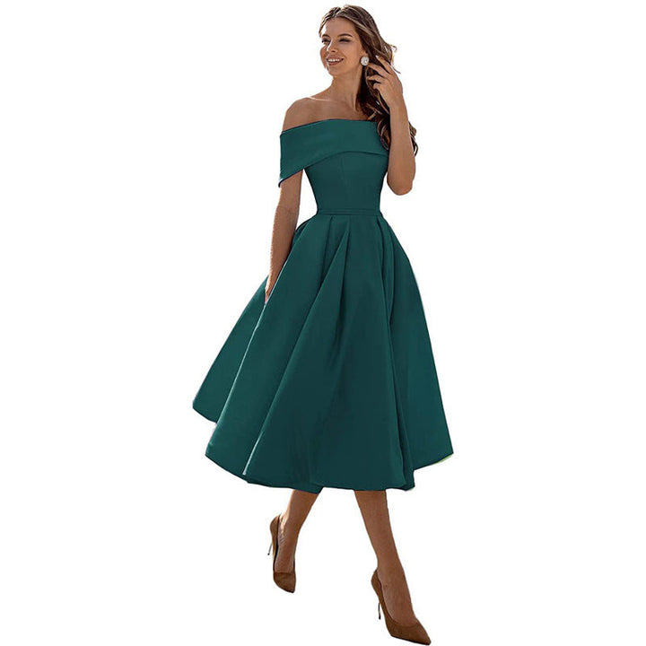 Modern style women's strapless cocktail dress, offering a flattering fit for evening wear & special occasions.