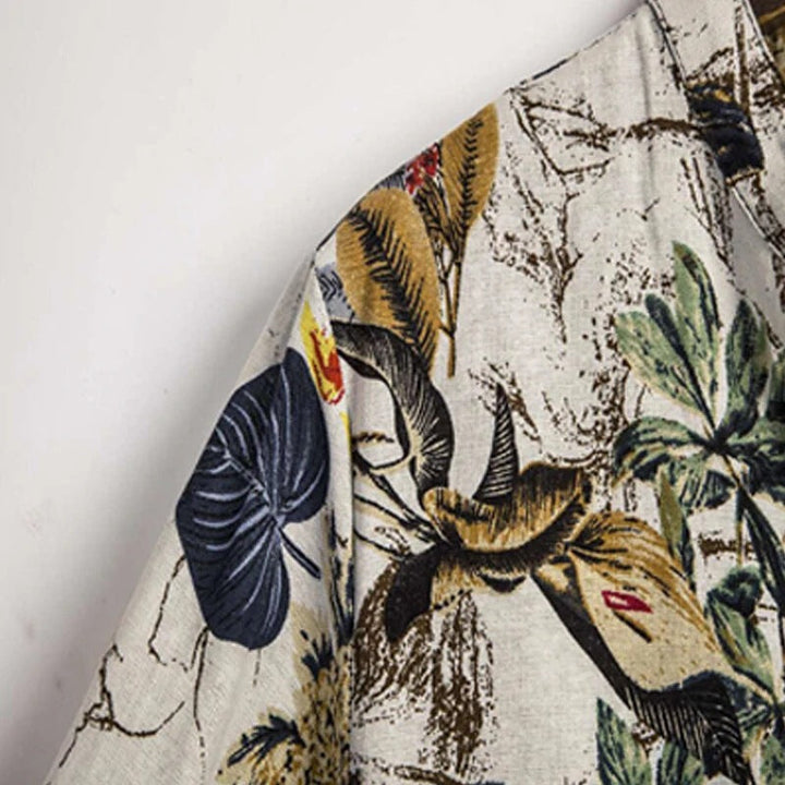 Stylish men's short sleeve floral henley with button placket, great for casual summer outfits.