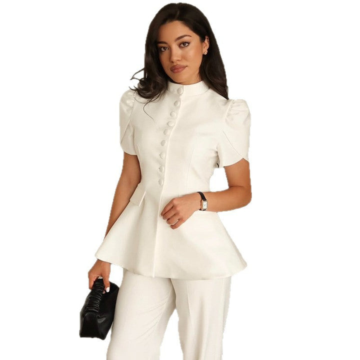 White elegant women's blazer jacket with stylish voluminous sleeves, perfect for professional or chic wear.