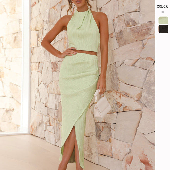 Elegant women's ruffled top and asymmetrical skirt two-piece set, perfect for evening wear or parties.