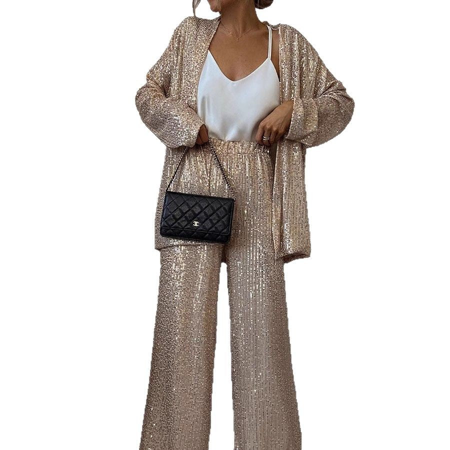 Shimmering sequin blazer and wide leg trousers for a sophisticated and glittering women's suit.