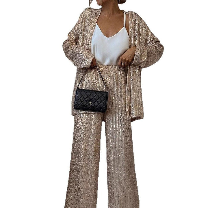 Shimmering sequin blazer and wide leg trousers for a sophisticated and glittering women's suit.