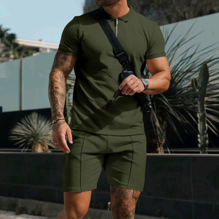 Comfortable men's activewear set: short sleeve top & shorts for training, featuring stylish contrast.