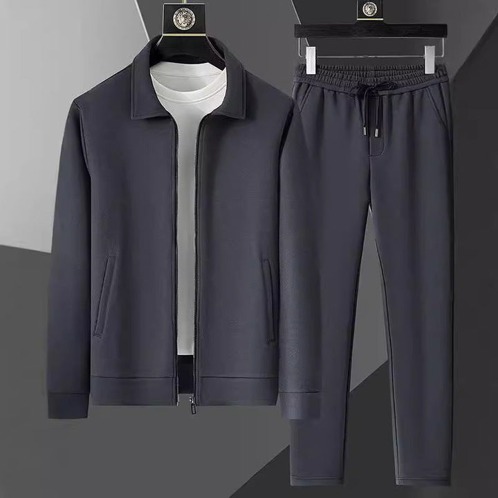 Stylish men's fashion tracksuit, perfect leisure wear with a sporty track jacket and matching jogger pants.