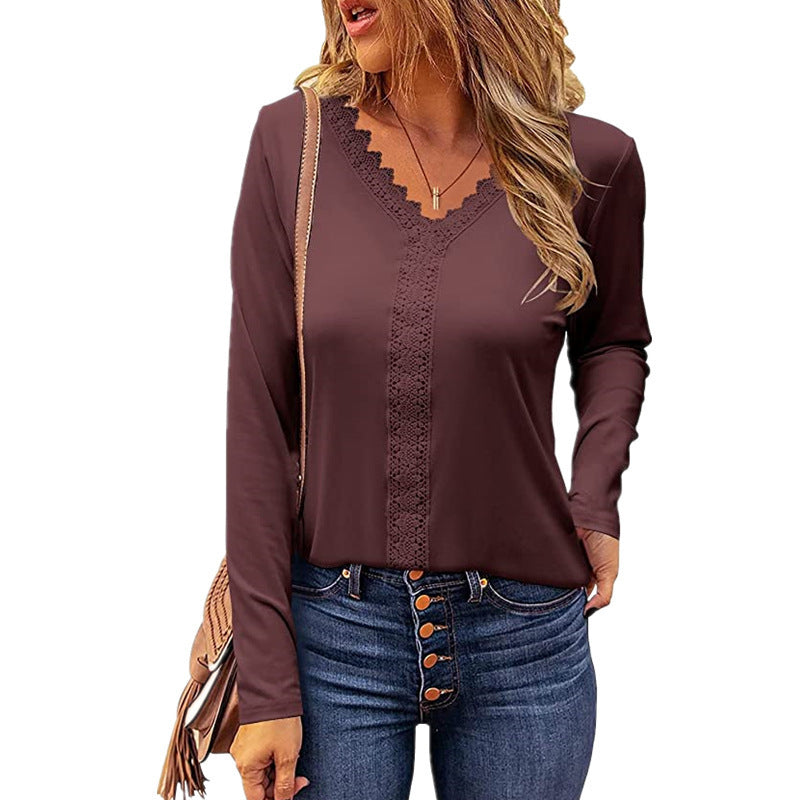 Stylish V-neck long sleeve top for women, featuring intricate lace detail on neckline & cuffs.