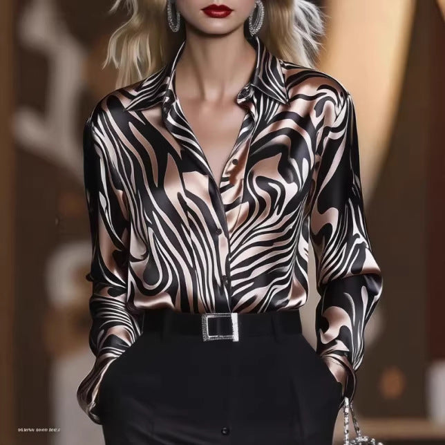 Elegant women's blouse in a unique wave pattern, offering versatile style for any fashion-forward look.
