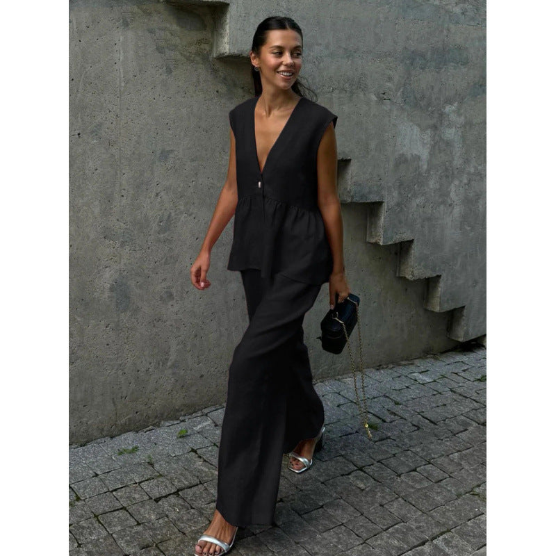 Chic women's casual summer outfit: V-neck top and wide-leg pants two-piece set.