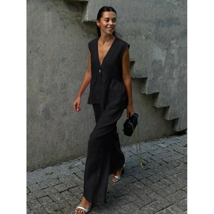 Chic women's casual summer outfit: V-neck top and wide-leg pants two-piece set.