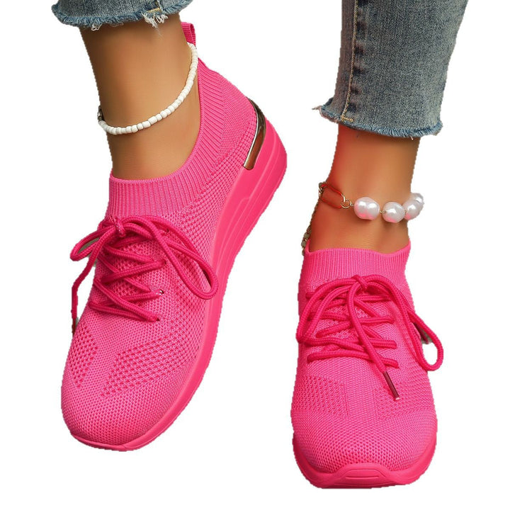White women's sport platform sneakers, breathable & comfortable, great for active or casual daily use.