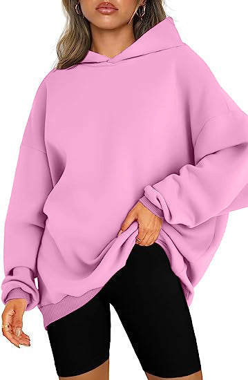Super cozy women's hoodie, a plush oversized top for winter warmth and style.