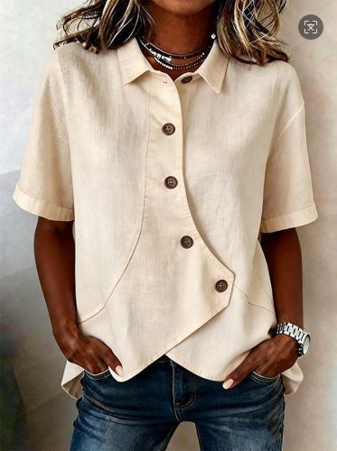 Sophisticated women's long-sleeve top with an elegant wavy pattern and chic button-up design.