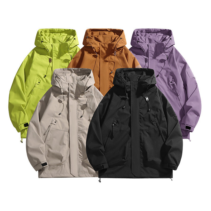 Stylish women's waterproof outdoor jacket. Features an adjustable hood, great for activewear and rain protection.