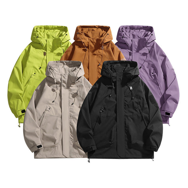 Stylish women's waterproof outdoor jacket. Features an adjustable hood, great for activewear and rain protection.