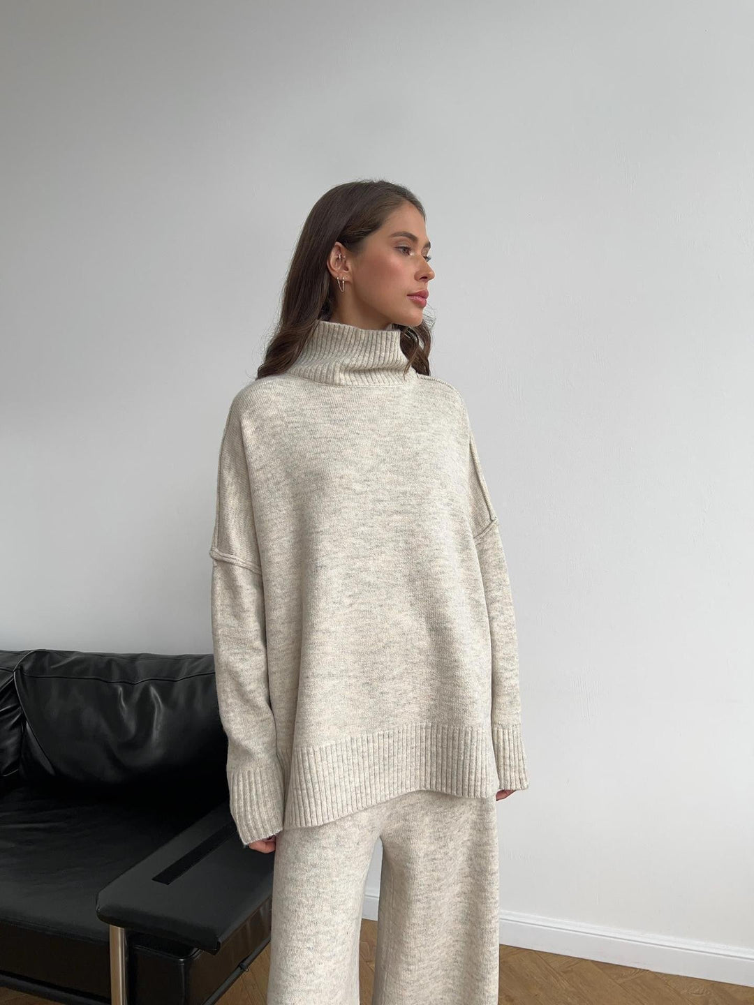 Women's cozy relaxed turtleneck lounge set, a comfortable two-piece matching outfit with wide-leg pants.