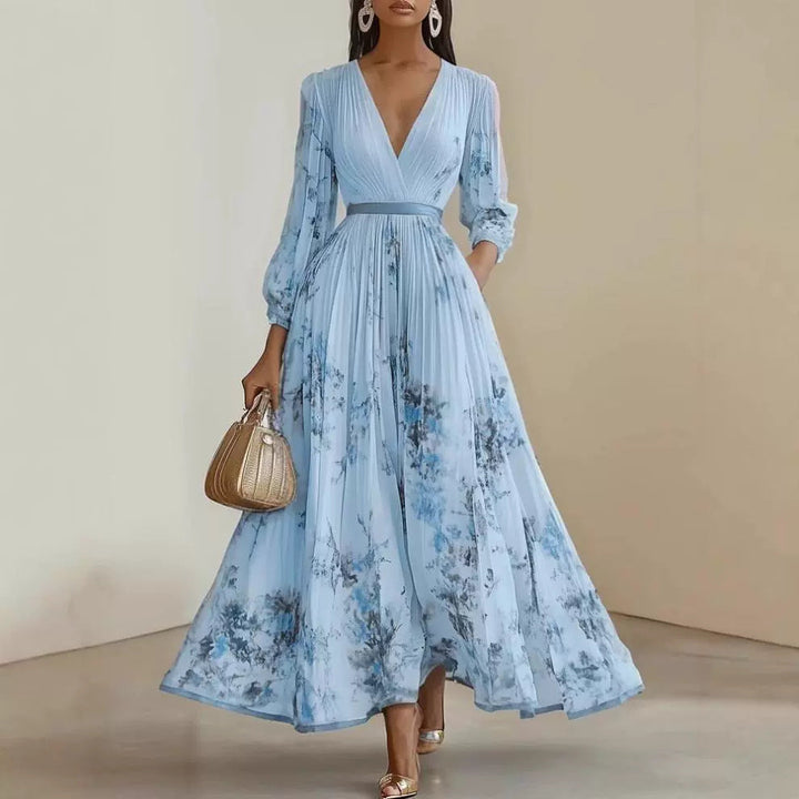 Flowy floral print V-neck maxi dress for women, featuring romantic puffed sleeves & an elegant silhouette.