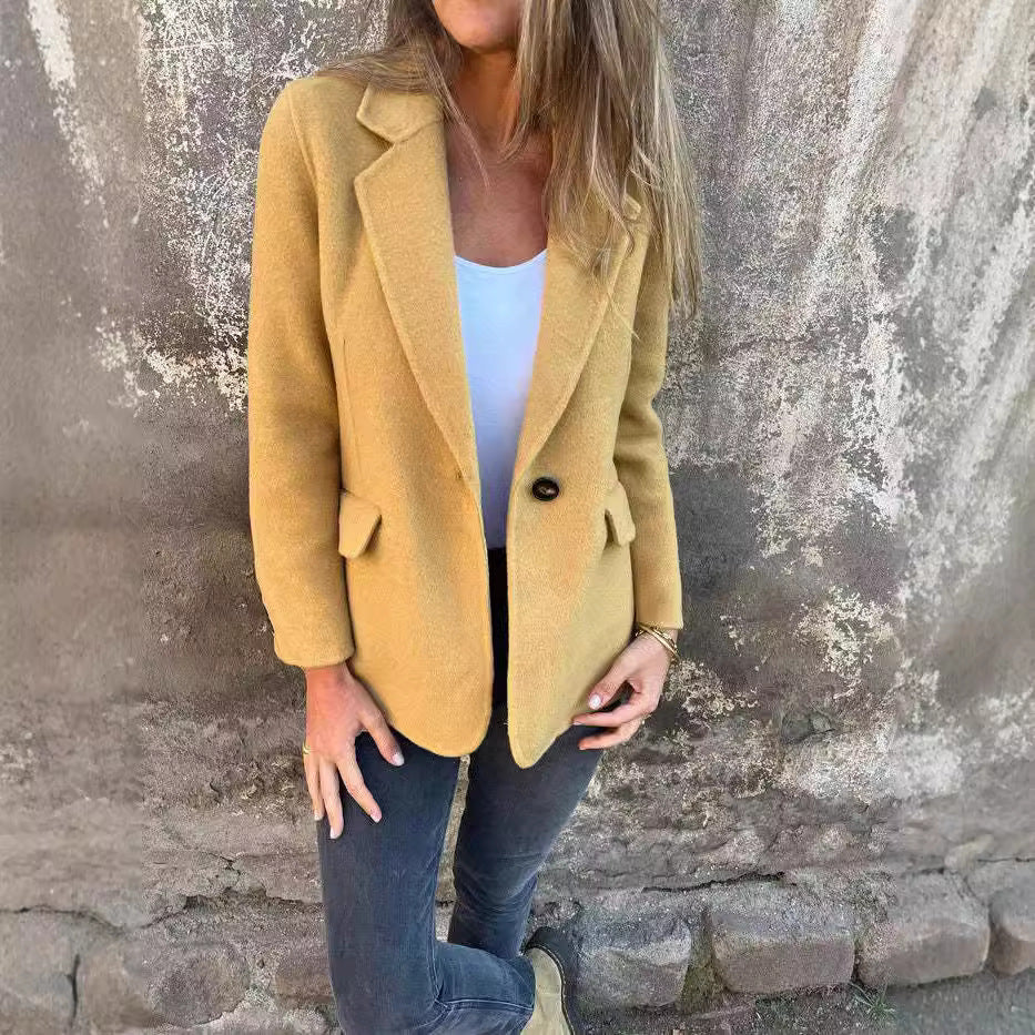 Professional women's elegant blazer, a chic relaxed fit jacket for modern office and business attire.