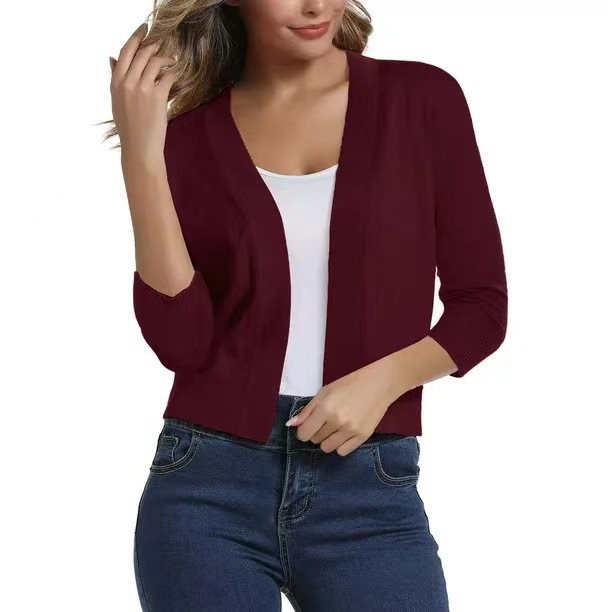 Casual women's open-front cardigan, 3/4 sleeves, designed for all-season comfort.