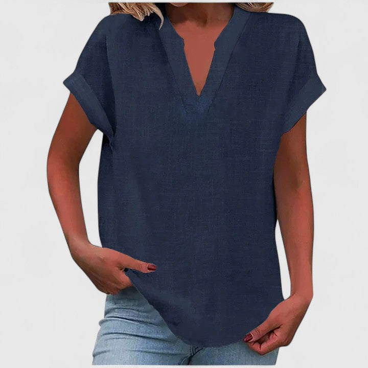Relaxed fit women's V-neck blouse, offering versatile style from day to night.