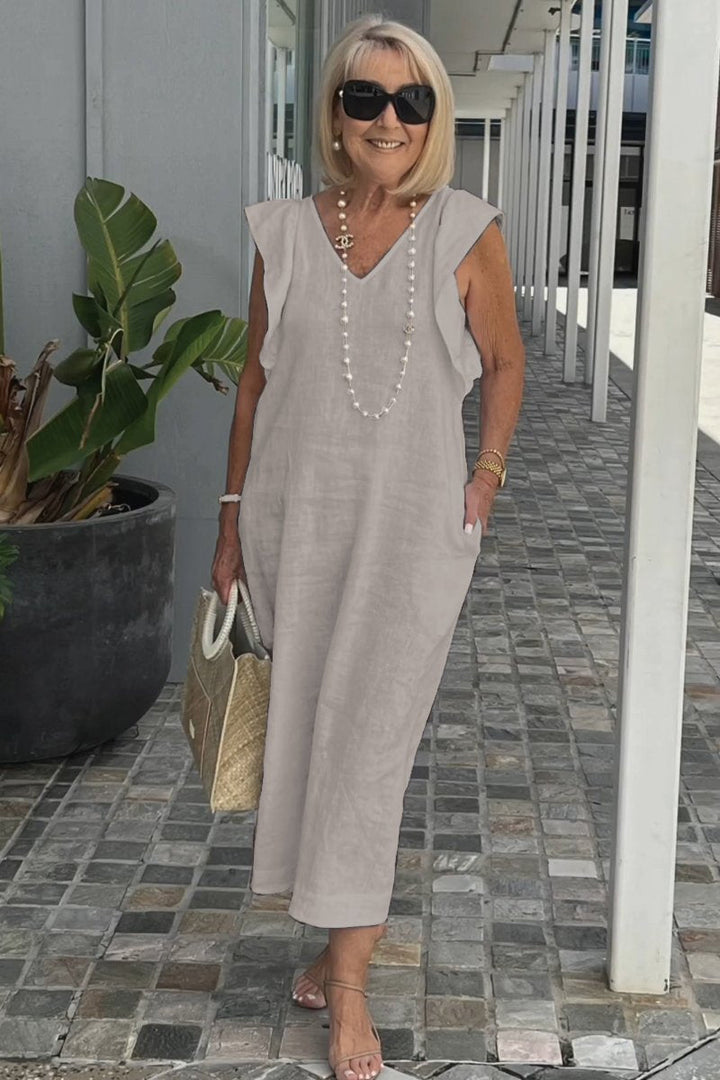 Comfortable sleeveless summer maxi dress for women, an elegant V-neck design with flowy fabric, great for vacations.