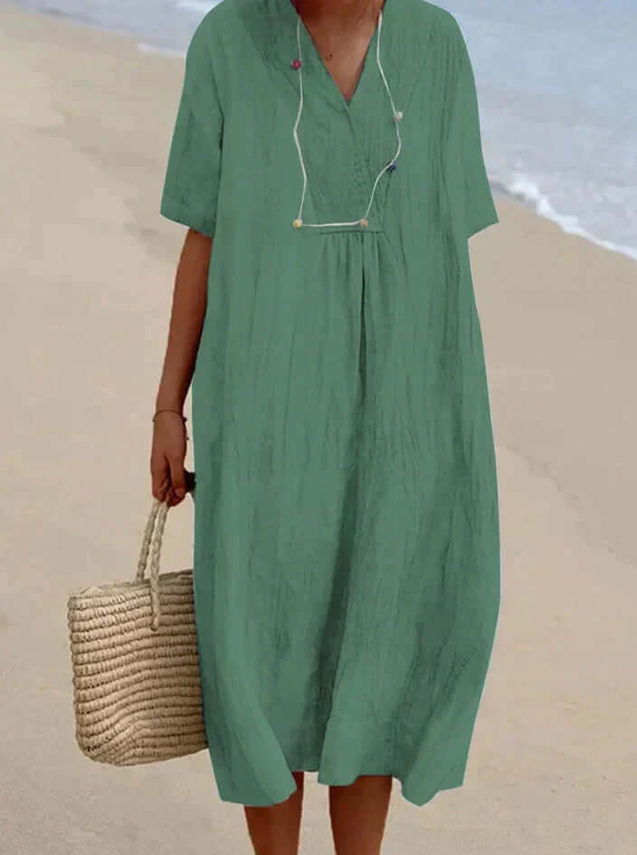 Comfortable & lightweight women's casual summer dress with a relaxed fit. Easy care for warm weather.
