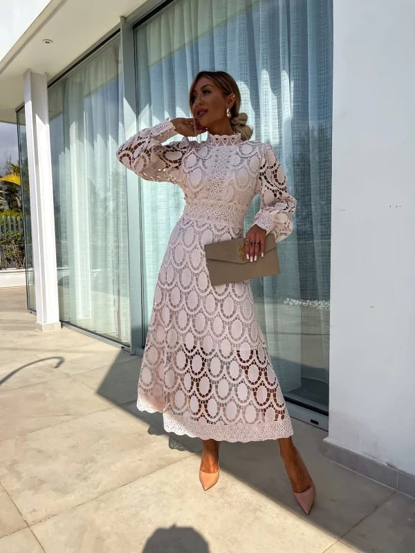 Elegant women's long sleeve party dress, perfect for special occasions & evening events. Flowing silhouette.