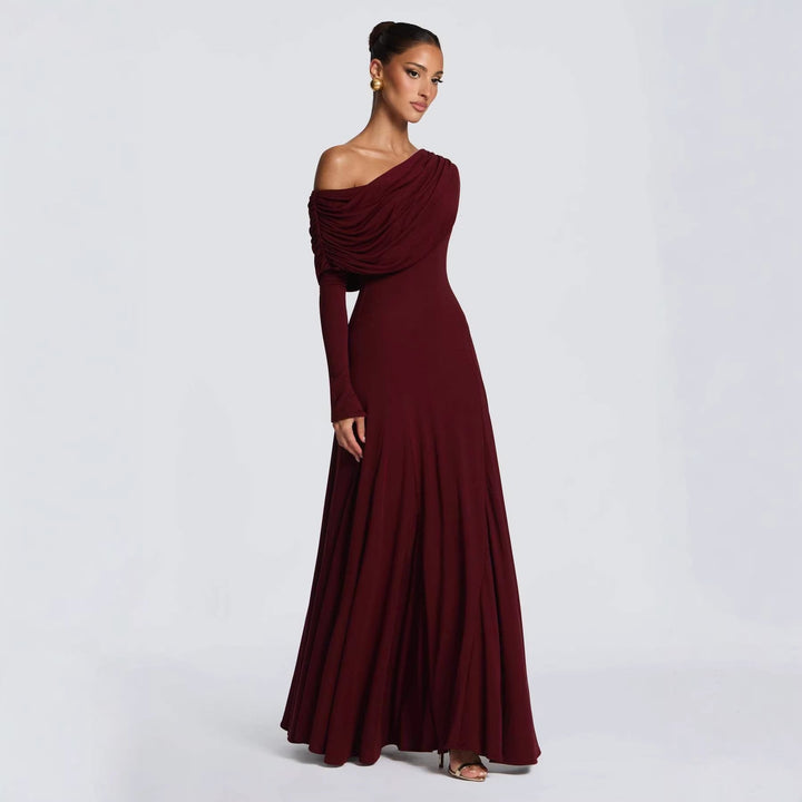 Sophisticated long sleeve maxi dress for women, with unique asymmetrical draping creating an elegant party look.