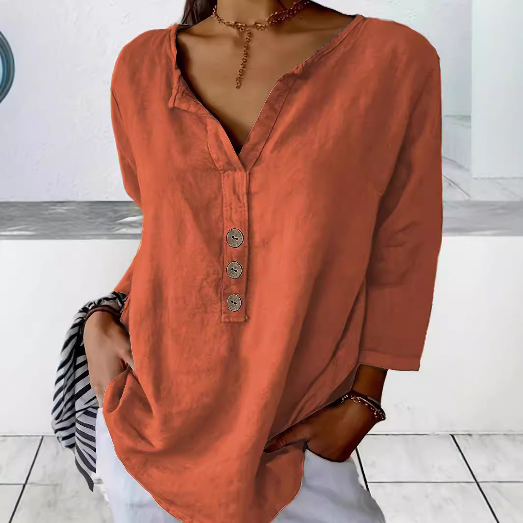 Women's effortless button-down v-neck blouse. Loose fit 3/4 sleeve for casual comfort & everyday wear.