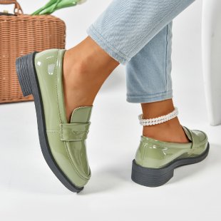 Comfortable green women's slip-on loafers, perfect casual flats for walking & effortless style.