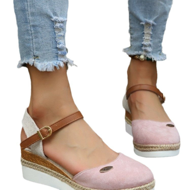 Side view of women's comfortable wedge sandals, highlighting the supportive wedge heel and elegant straps.