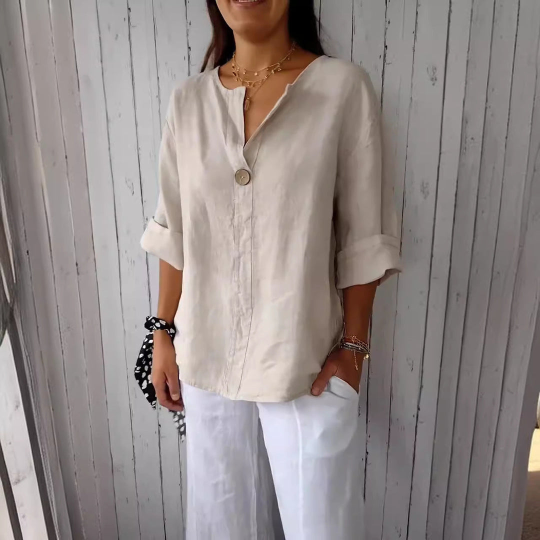 Flowy women's casual top, versatile button-front shirt. Effortless comfort for summer wear.