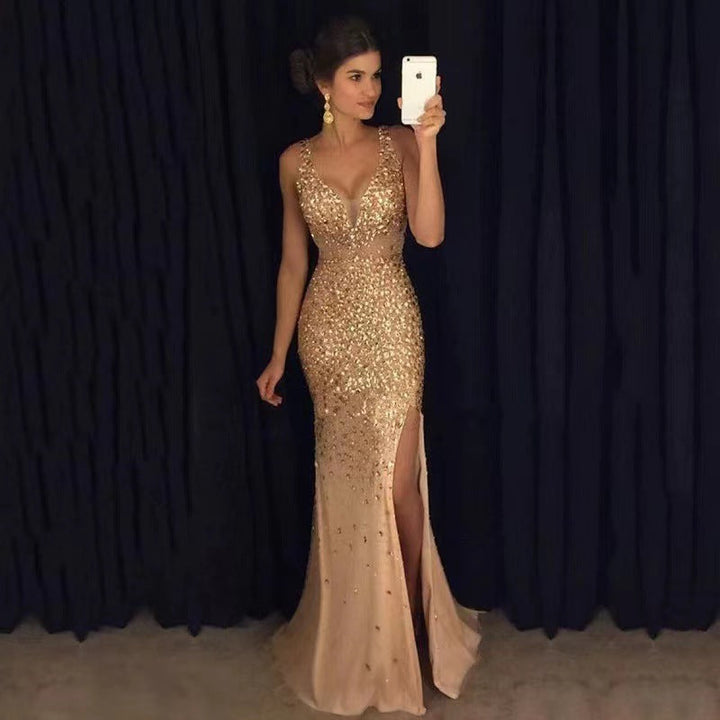Women's elegant sleeveless V-neck ball gown with sparkling sequins and a stylish thigh slit. Perfect for prom.