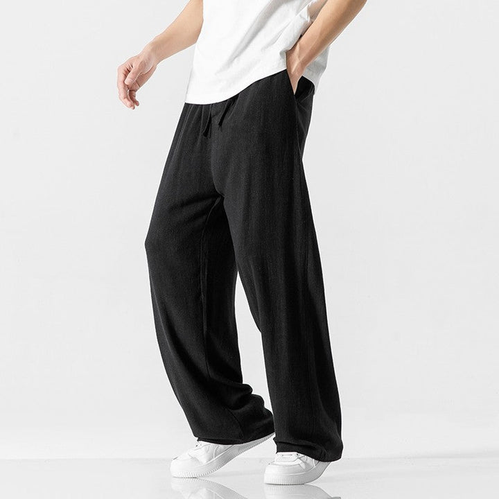 Men's fashion loose fit trousers, full length, featuring a secure and comfy drawstring waist.