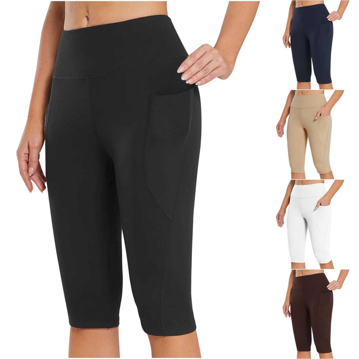 Women's sporty high-waist capri pants with convenient side pockets for activewear.