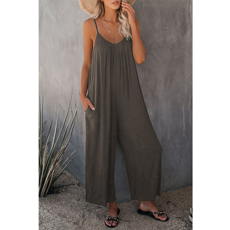 Simple & chic women's summer jumpsuit, sleeveless with a plunging neckline, relaxed fit & stylish pockets.