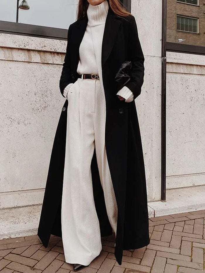 Elegant women's fall coat, double-breasted design with ample deep pockets, a chic wardrobe essential.