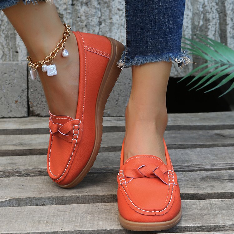 Fashionable women's slip-on shoes, featuring a dainty bow applique and a practical non-slip sole.