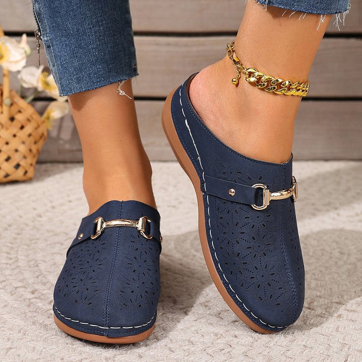 Stylish women's floral clogs, comfortable slip-on shoes, ideal for casual outings & fashion comfort.