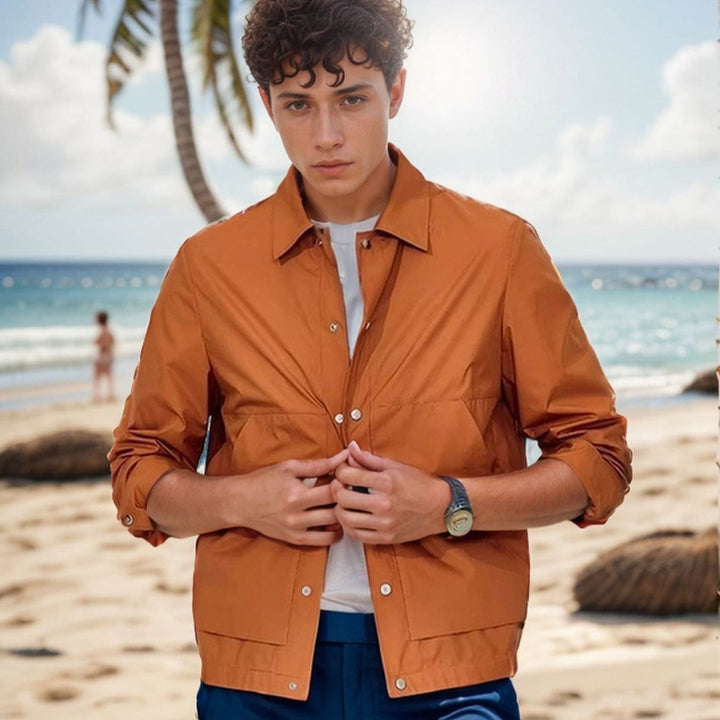 Men's lightweight summer jacket with snap closure, ideal for casual outdoor activities.